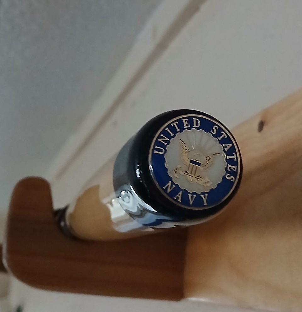 Enamel United States Navy pin butt cap on a custom turned Ash grip with Katalox butt and Bishopwood inlay, containing a sealed canister with ashes of a loved one.